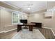 Office featuring large window for natural light, ceiling fan, recessed lighting, and desk at 2738 Riderwood Ne Ln, Marietta, GA 30062
