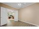 View into bright office space with dark wood-look floors and neutral-colored walls at 2738 Riderwood Ne Ln, Marietta, GA 30062