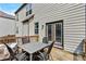 Outdoor wooden back deck with seating, perfect for relaxing and entertaining at 4568 Mantova Dr, Buford, GA 30519