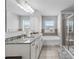 Double vanity sink and separate shower in the bathroom at 4568 Mantova Dr, Buford, GA 30519