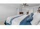A bed and pillows fill the main bedroom at 4568 Mantova Dr, Buford, GA 30519