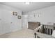 Cozy bedroom with a neutral color scheme, crib and dresser at 4568 Mantova Dr, Buford, GA 30519