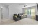Bright room with carpet and seating area at 4568 Mantova Dr, Buford, GA 30519