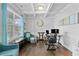 Bright office space with natural light, coffered ceiling, wainscotting, and comfortable seating area at 4568 Mantova Dr, Buford, GA 30519