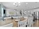 Open-concept living space showing the kitchen, dining, and living room areas at 4568 Mantova Dr, Buford, GA 30519