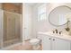 Bathroom with shower and white vanity at 5470 Beaver Ridge Dr, Cumming, GA 30040