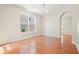Bright, spacious living room with hardwood floors and natural light, ready for your personal touch at 5470 Beaver Ridge Dr, Cumming, GA 30040