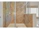 Shower with diamond tile and glass door at 5470 Beaver Ridge Dr, Cumming, GA 30040