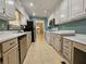 Functional kitchen featuring white cabinets and modern appliances at 105 Old Hickory Pointe, Mcdonough, GA 30252