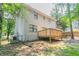 Backyard with wooden deck and trees at 5292 Mountain Village Ct, Stone Mountain, GA 30083