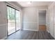 View of the kitchen with adjacent dining space and access to the outdoor deck at 5292 Mountain Village Ct, Stone Mountain, GA 30083
