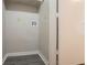 Functional laundry room with washer hookups and storage space at 5292 Mountain Village Ct, Stone Mountain, GA 30083