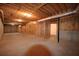 Unfinished basement with concrete floors and exposed framing, ready for customization and future expansion at 830 Cramac Dr, Lawrenceville, GA 30046