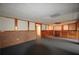 Basement with ample space, wooden trim, and brick wall at 830 Cramac Dr, Lawrenceville, GA 30046