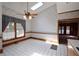 Bright breakfast nook featuring a skylight, ceiling fan, and a large window at 830 Cramac Dr, Lawrenceville, GA 30046