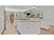 Spacious kitchen with island, granite countertops, stainless steel appliances at 120 Forest Breeze Cv, Alpharetta, GA 30022