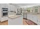 Well-lit kitchen with stainless steel appliances, and lots of counterspace at 120 Forest Breeze Cv, Alpharetta, GA 30022