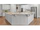 Gourmet kitchen with granite countertops, stainless steel appliances, and custom cabinets at 120 Forest Breeze Cv, Alpharetta, GA 30022