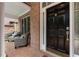 Cozy front porch with seating area, brick facade, and a welcoming entrance at 1055 Beacon Hill Xing, Alpharetta, GA 30005
