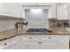 A kitchen showcasing granite countertops and subway tile backsplash at 1055 Beacon Hill Xing, Alpharetta, GA 30005