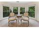 A sitting area in a main bedroom with lots of natural light at 1055 Beacon Hill Xing, Alpharetta, GA 30005