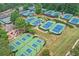 Aerial view of numerous tennis courts and pickleball courts at 1055 Beacon Hill Xing, Alpharetta, GA 30005