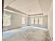 Main bedroom with drywall ready for paint features multiple windows and a tray ceiling at 133 West Lake Blvd, Carrollton, GA 30116