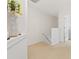 Well-lit hallway with fresh paint, neutral carpeting, and white trim at 2457 Birkhall Way # 2457, Lawrenceville, GA 30043
