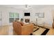 Cozy living room with a fireplace, hardwood floors, and a comfortable seating area at 2457 Birkhall Way # 2457, Lawrenceville, GA 30043