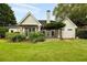 Charming backyard featuring a patio, well-maintained lawn, and lush landscaping for privacy at 3753 Honey Pot Ne Way, Marietta, GA 30066