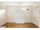 Expansive walk-in closet with hardwood floors and built-in shelving and cabinets offers ample storage at 3753 Honey Pot Ne Way, Marietta, GA 30066