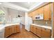 Bright kitchen with wood cabinets and stainless appliances features an open layout for easy entertaining at 3753 Honey Pot Ne Way, Marietta, GA 30066