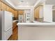 Kitchen boasts light wood cabinetry, modern appliances, and a functional layout for cooking and entertaining at 3753 Honey Pot Ne Way, Marietta, GA 30066
