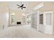 Spacious living room with built-in bookcases, fireplace, and vaulted ceiling at 3753 Honey Pot Ne Way, Marietta, GA 30066