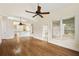 The living room features hardwood floors, high ceilings, abundant natural light, and an open flow into the kitchen at 3753 Honey Pot Ne Way, Marietta, GA 30066