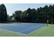Enjoy a game on the community tennis courts surrounded by mature trees and well-maintained grounds at 3753 Honey Pot Ne Way, Marietta, GA 30066