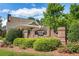 Community sign with brick surround and lush landscaping at 3916 Abbott Way # 2, Powder Springs, GA 30127