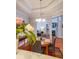 Bright dining room features modern chandelier, with living space visible through doorway at 3916 Abbott Way # 2, Powder Springs, GA 30127