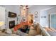 Bright living room with hardwood floors, fireplace, built-ins and access to other rooms at 3916 Abbott Way # 2, Powder Springs, GA 30127