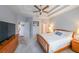 Comfortable bedroom with tray ceilings, carpeted floors, and natural light from windows at 3916 Abbott Way # 2, Powder Springs, GA 30127