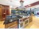 The kitchen features a Wolf range, stainless steel appliances, and a marble countertop at 3985 Loch Highland Ne Pass, Roswell, GA 30075