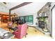 Spacious living room with fireplace and lots of natural light at 3985 Loch Highland Ne Pass, Roswell, GA 30075