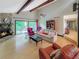 Living room with stone fireplace and natural light at 3985 Loch Highland Ne Pass, Roswell, GA 30075