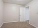 Bedroom with neutral carpet and paint at 2140 Deer Trl, Suwanee, GA 30024