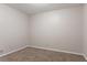 Bedroom with neutral carpet and paint at 2140 Deer Trl, Suwanee, GA 30024