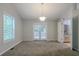 Bright dining area with views to backyard and access to kitchen at 2140 Deer Trl, Suwanee, GA 30024