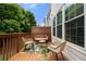 Relaxing back deck with outdoor seating and a view of the lush greenery at 3655 Chattahoochee Summit Se Dr # 16, Atlanta, GA 30339