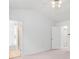 Bright bedroom with an ensuite bathroom featuring neutral colored walls and carpeted floor at 3655 Chattahoochee Summit Se Dr # 16, Atlanta, GA 30339