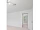 Comfortable bedroom featuring neutral colored walls and carpeted floor, with an ensuite bathroom at 3655 Chattahoochee Summit Se Dr # 16, Atlanta, GA 30339