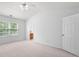 Comfortable bedroom featuring an ensuite bathroom, carpeted floor, and ample natural light at 3655 Chattahoochee Summit Se Dr # 16, Atlanta, GA 30339